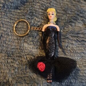 vintage collectible is a "Solo in the Spotlight" Barbie keychain 1990s